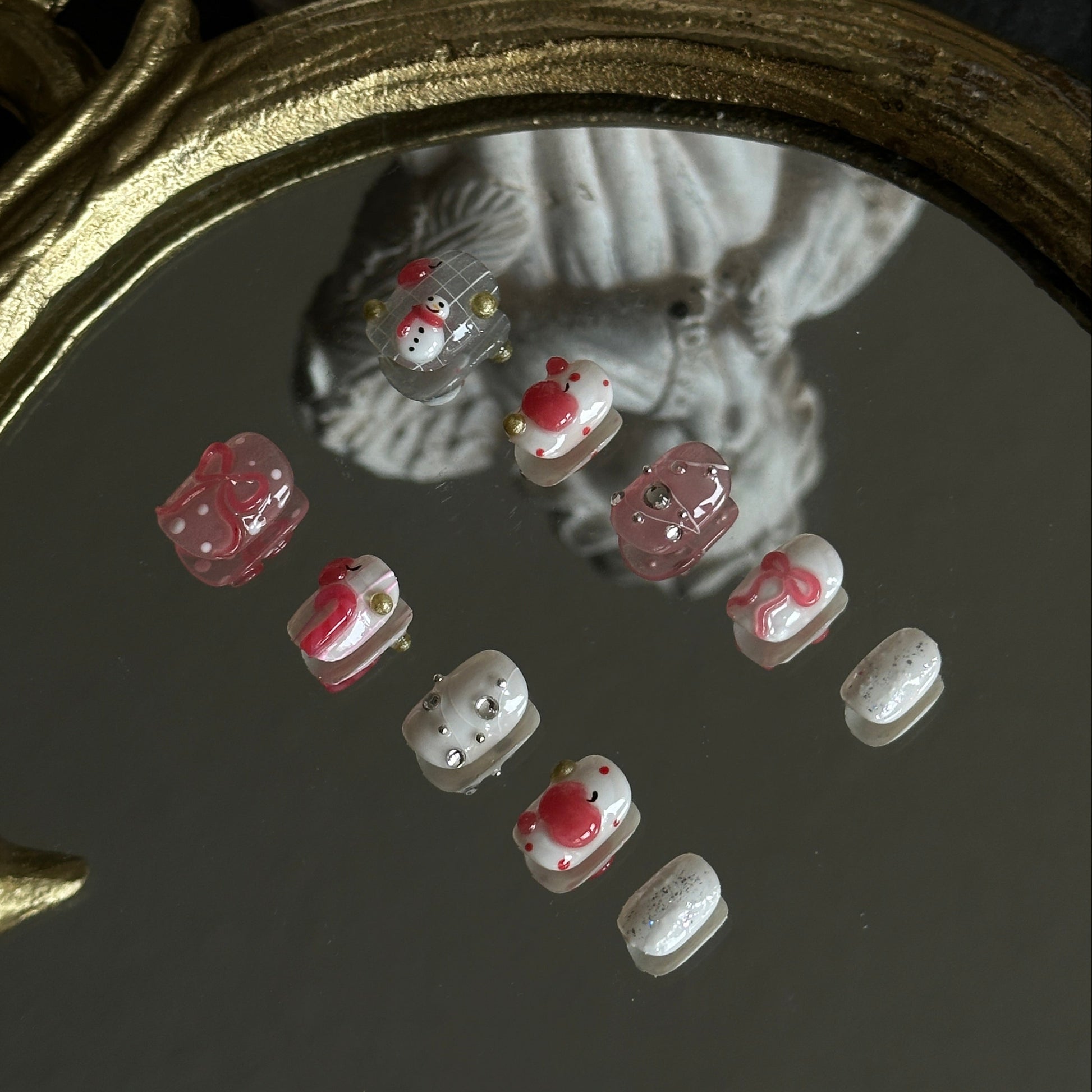 apple candy cane rhinestone fairy light press-on nails detail
