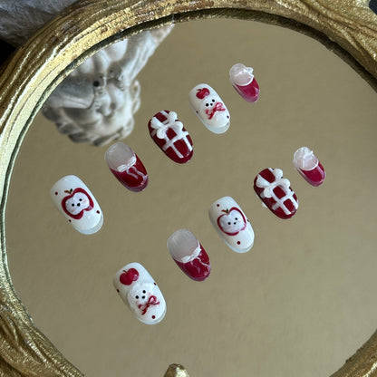 Left side detail of MYOB Nails Apple Puppy set highlighting the delicate hand-painted puppy and apple motifs on a white base.