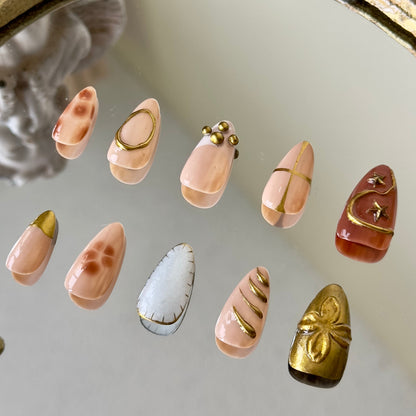 Back view showcasing the regal almond shape and the sophisticated baroque aesthetic of Auric.