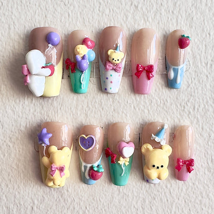 Front view of Bearthday Party nails showing the vibrant pastel French tips and playful 3D characters.
