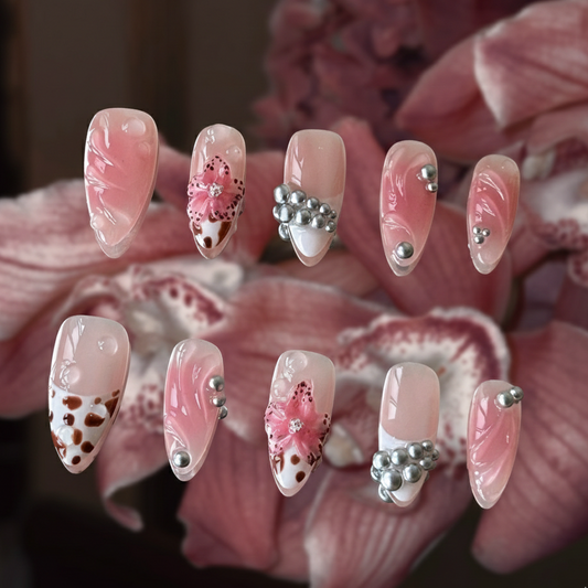 Bloomwild by MYOB Nails featuring pink blush gradients, leopard print French tips, and 3D floral accents.