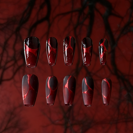 Burn by MYOB Nails featuring a dramatic red cat-eye base with black root gradients and metallic red chrome lines.