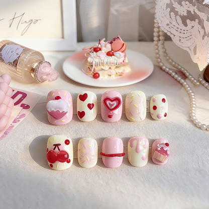 Cherry Cake press-on nails by MYOB Nails featuring 3D sculpted cakes, cherries, and sweet candy details.