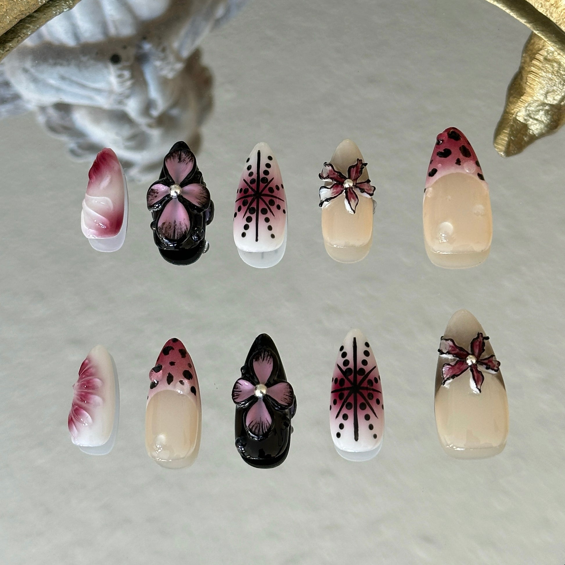 Back view showcasing the elegant almond shape and the layered 3D petal textures of the Dusk Orchid set.