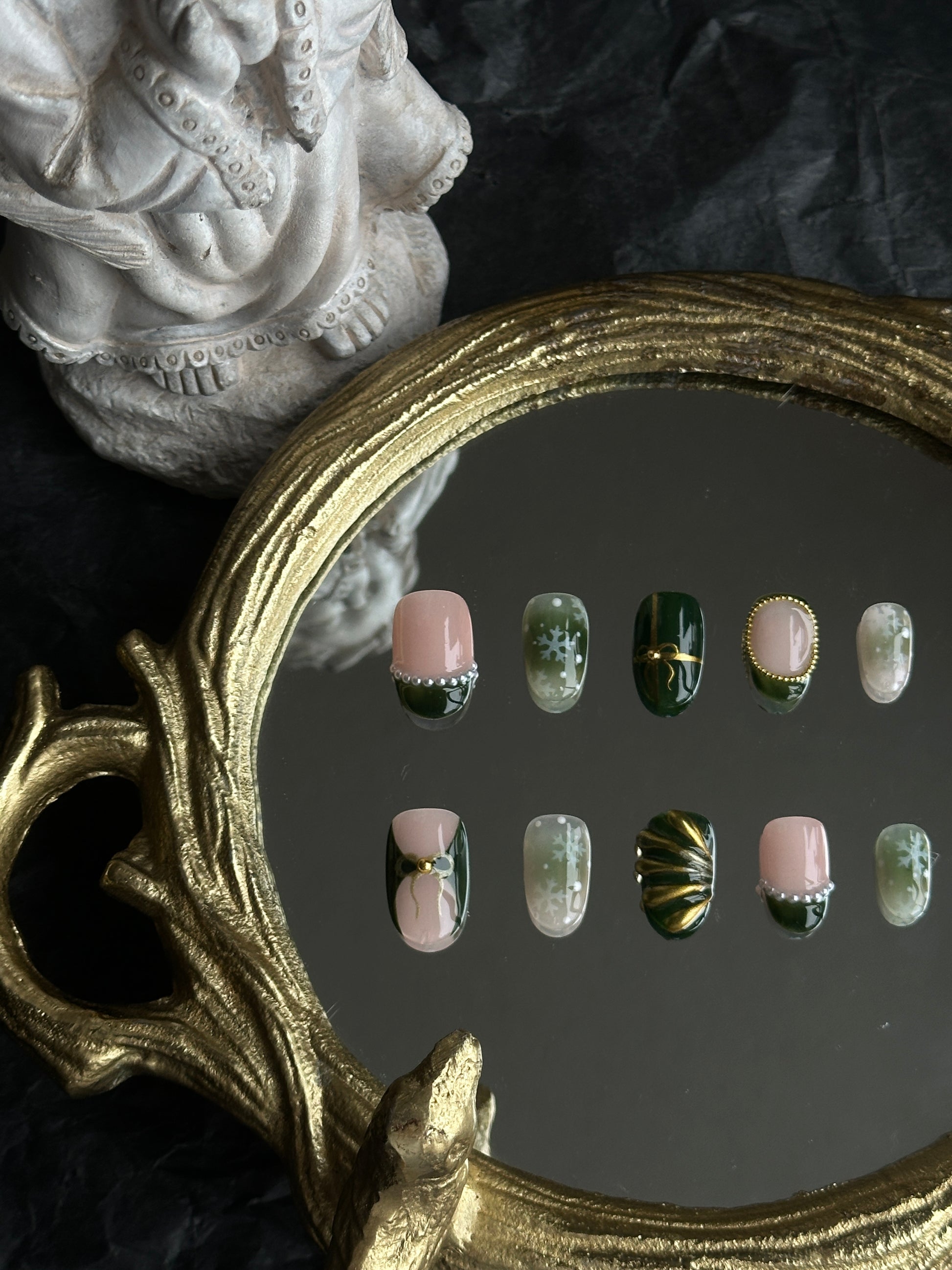 deep green and gold christmas nail set, with gold beads, pearls and snowflake