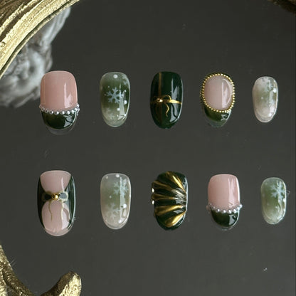 deep green and gold christmas nail set, with gold beads, pearls and snowflake