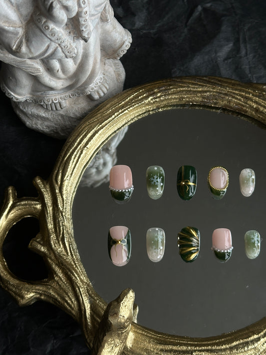 deep green and gold christmas nail set, with gold beads, pearls and snowflake