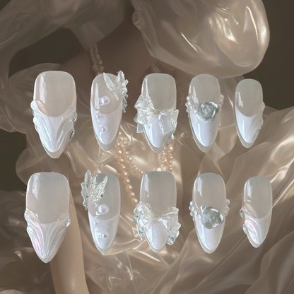 Fairy Bride press-on nails by MYOB Nails featuring 3D transparent butterflies, white roses, and elegant French tips.