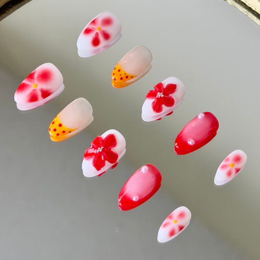 Side view highlighting the artisanal 3D red flowers on a white base and seamless red-to-white ombre effects.