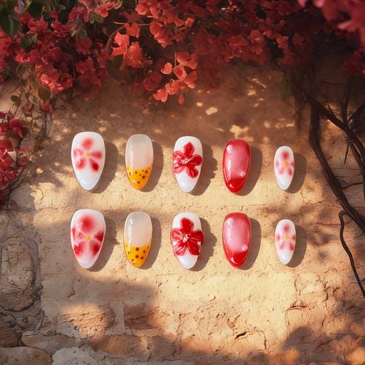 Flamekissed by MYOB Nails featuring a vibrant red, white, and yellow palette with 3D floral and polka dot accents.