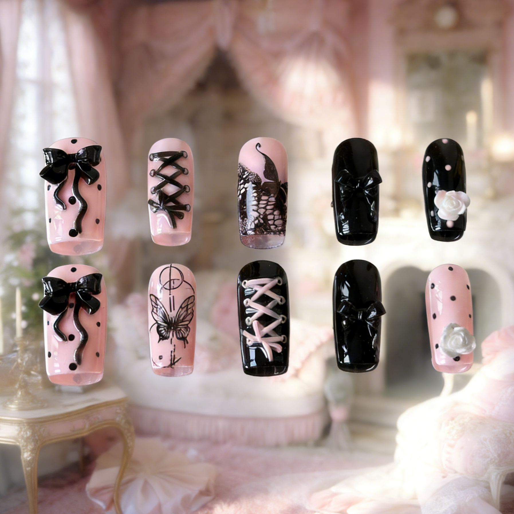 Gothic Lolita nails by MYOB Nails featuring pink and black bases, 3D roses, and corset lace-up designs.