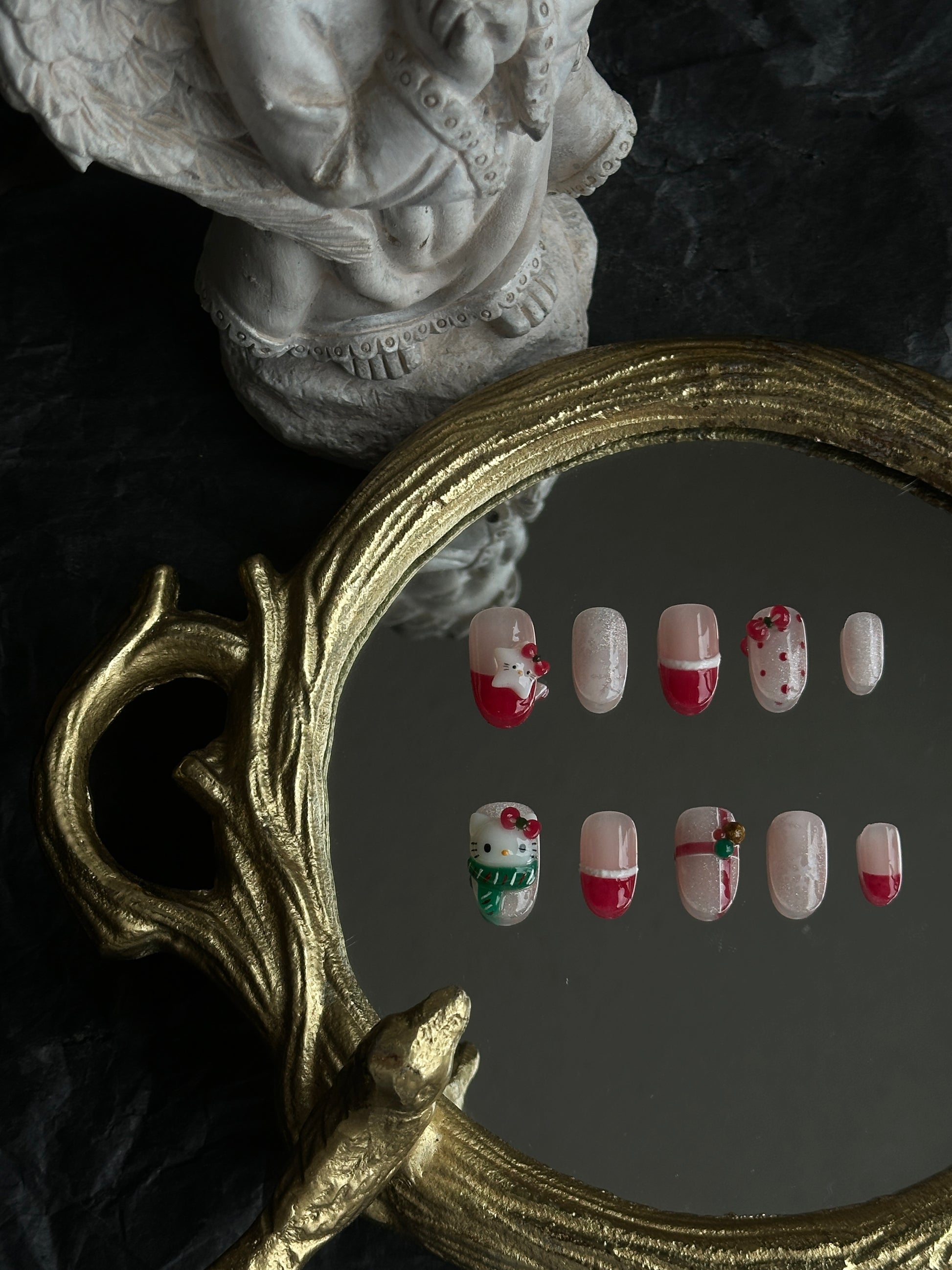 cute red and green hello kitty christmas nail set, medium length oval with 3d charms