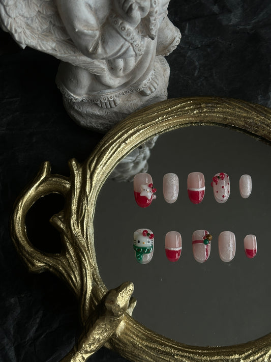 cute red and green hello kitty christmas nail set, medium length oval with 3d charms
