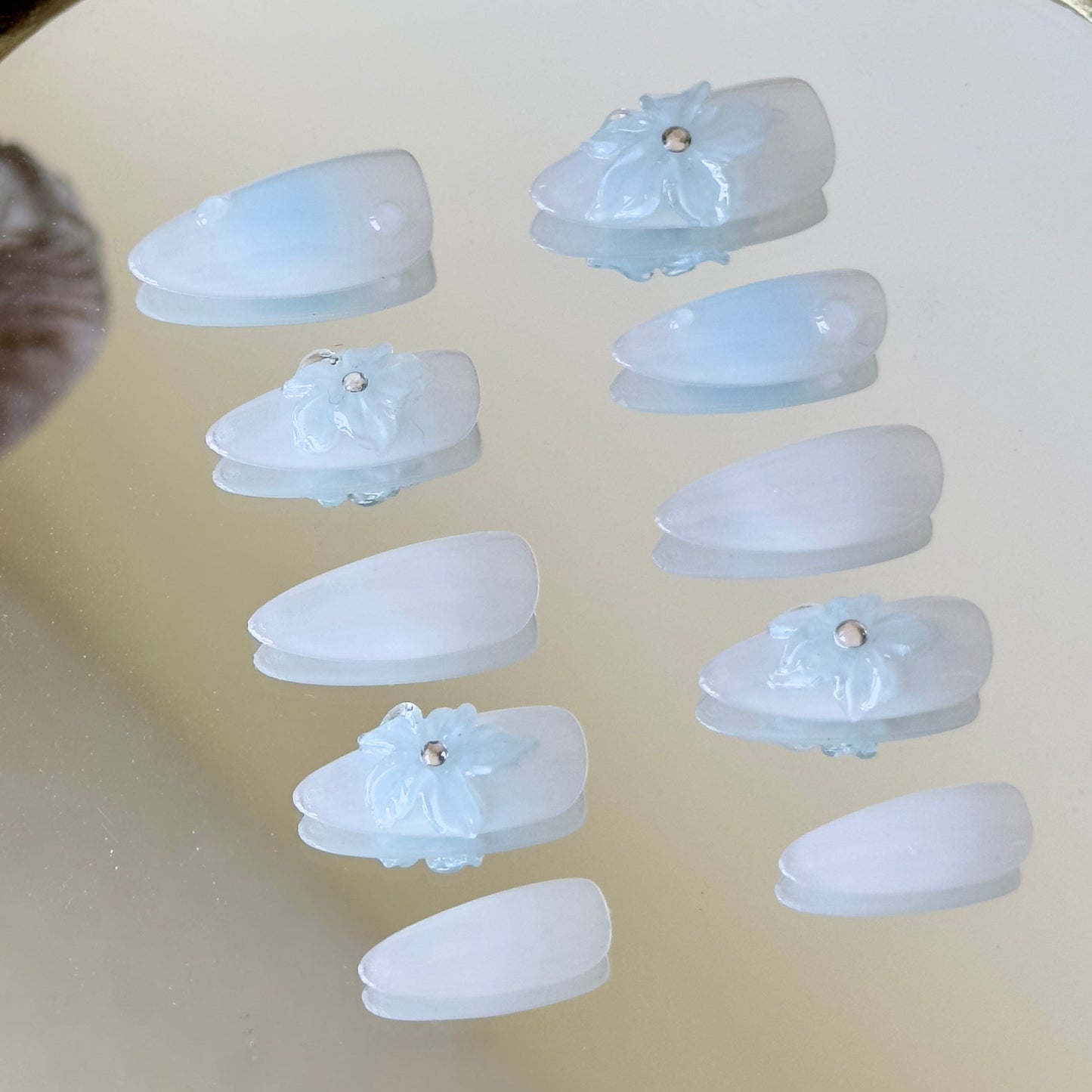 Detailed view of the layered 3D floral effect resembling flowers frozen in ice.