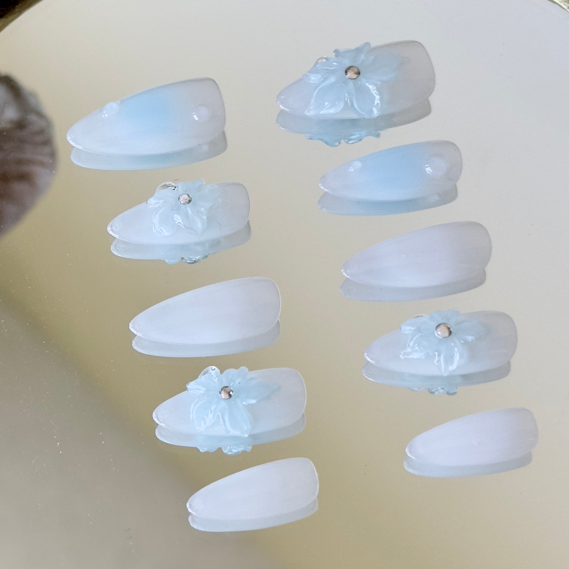 Detailed view of the layered 3D floral effect resembling flowers frozen in ice.