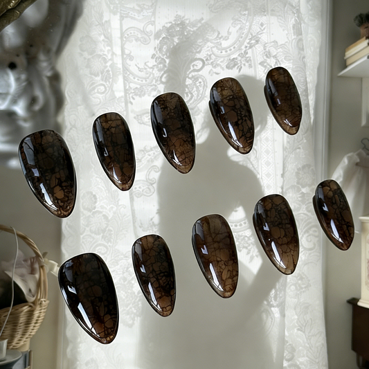 Lacelle press-on nails by MYOB Nails featuring a mysterious black lace print and sheer black gradient.