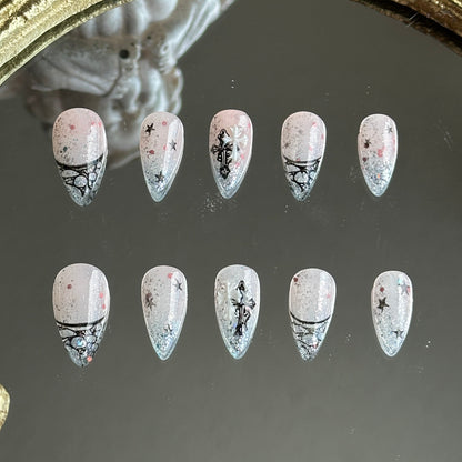 Front view of Lunar Veil handmade nails with silver-pink glitter base, nude pink gradient, and intricate black lace art.