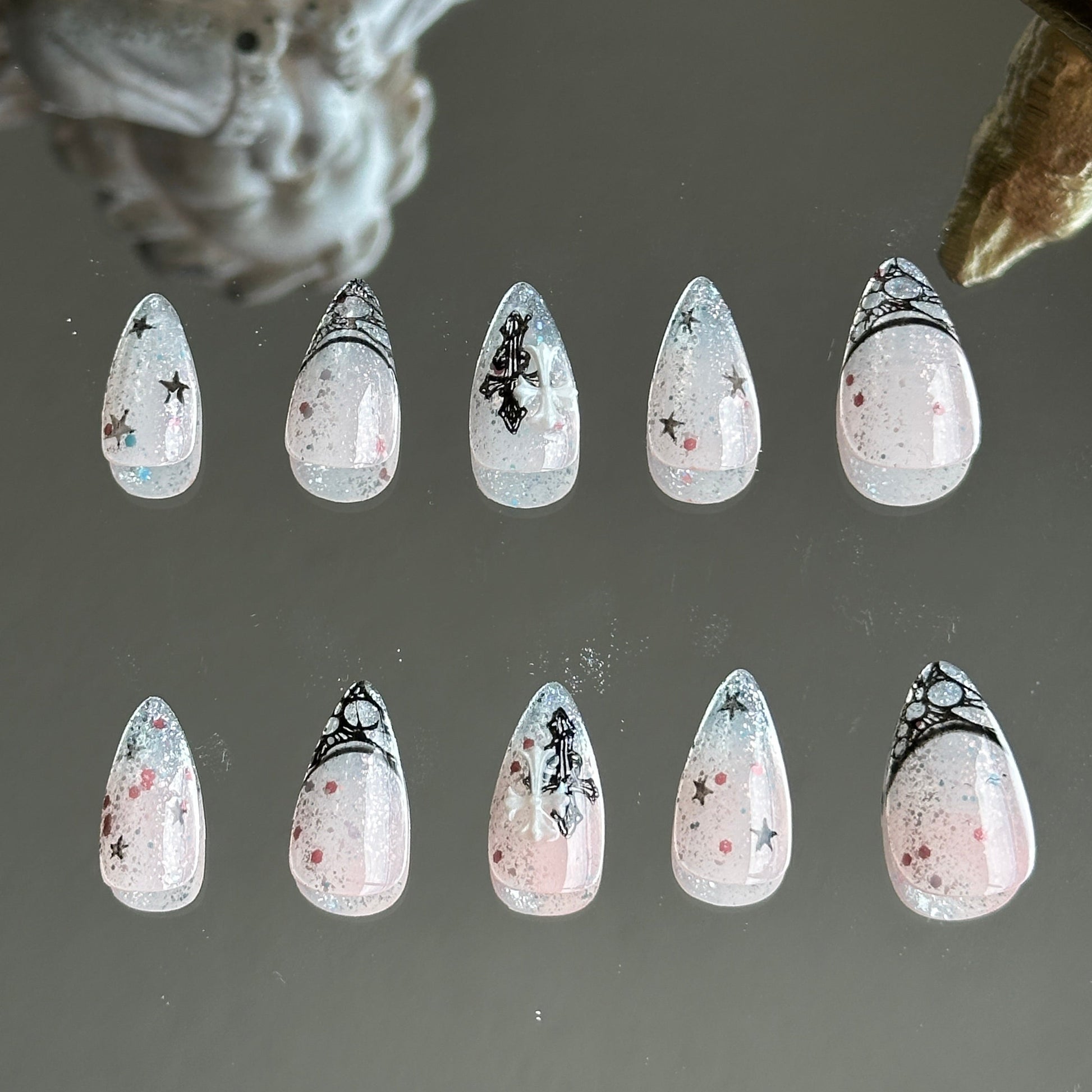 Back view of the set highlighting the subtle shimmer of silver and pink glitters under the nude pink gradient.