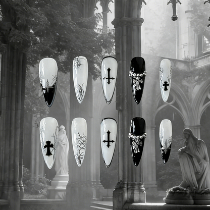 Luxthorn press-on nails by MYOB Nails featuring bold black French tips, silver crosses, and chrome thorns on sheer white.