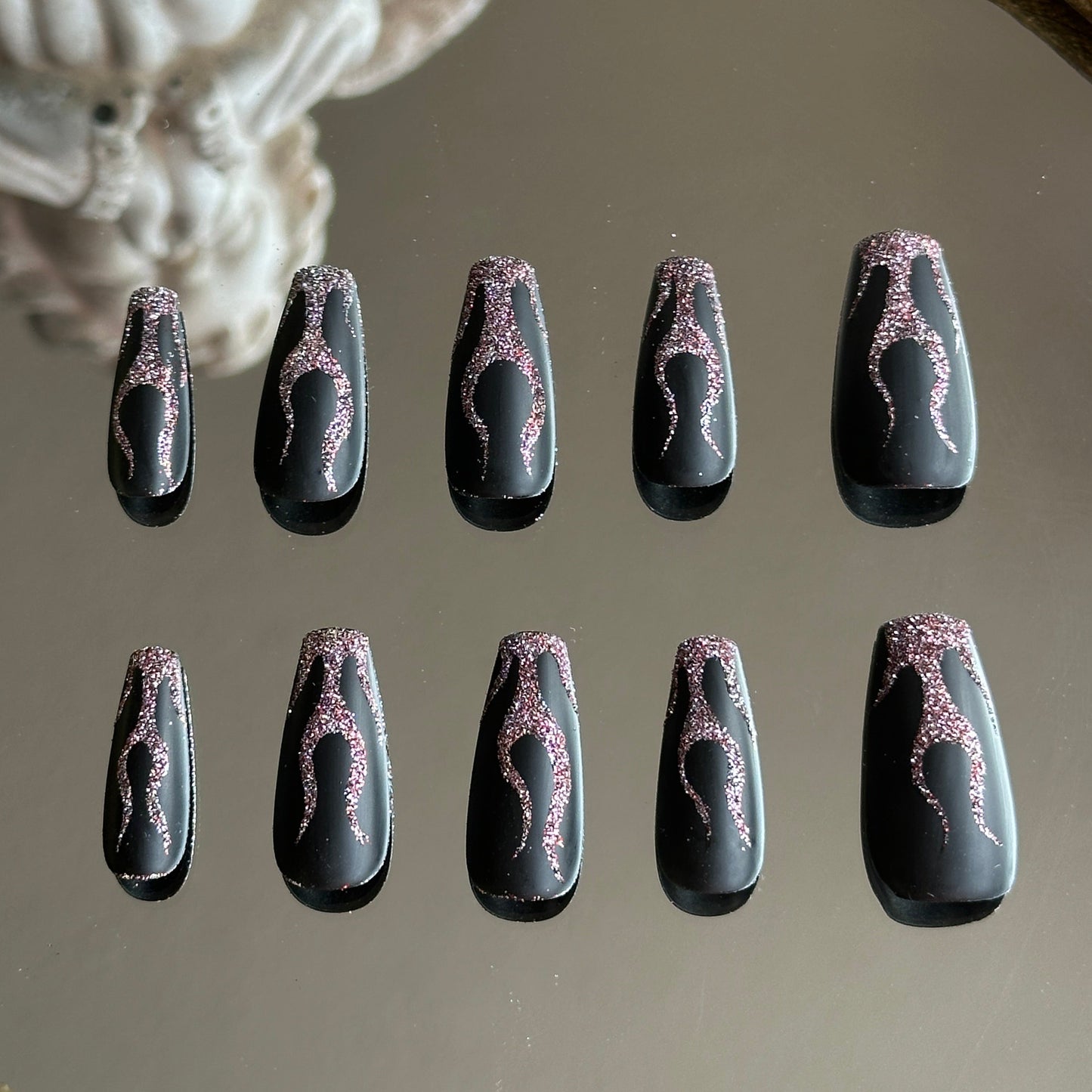 Back view of the handcrafted set showcasing the dynamic and organic flame shapes on each nail.