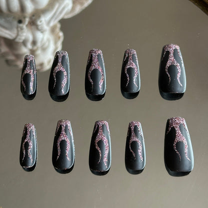 Back view of the handcrafted set showcasing the dynamic and organic flame shapes on each nail.