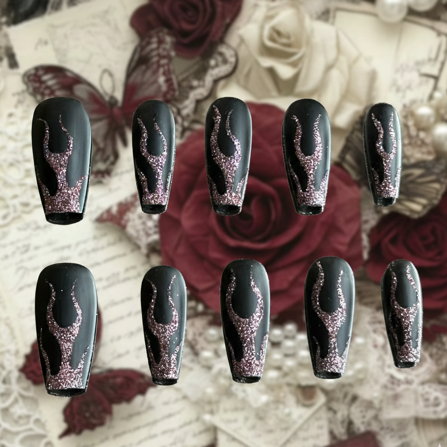 Midnight Blaze press-on nails by MYOB Nails featuring textured red glitter flames on a sleek matte black base.