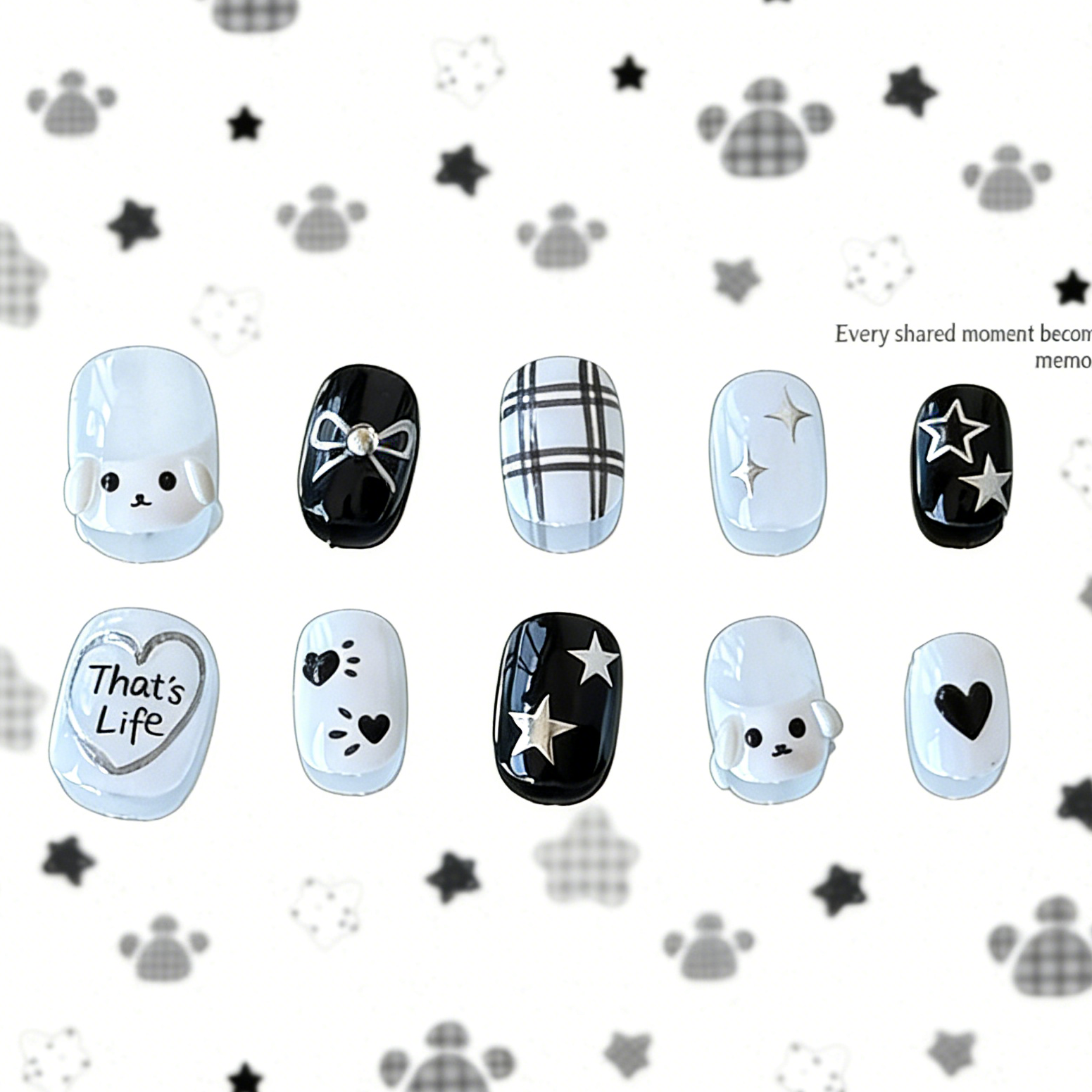 Full set of MYOB Nails PupStar press-on nails in minimalist black and white, featuring 3D puppy charms, silver "That's Life" heart art, and star doodles.
