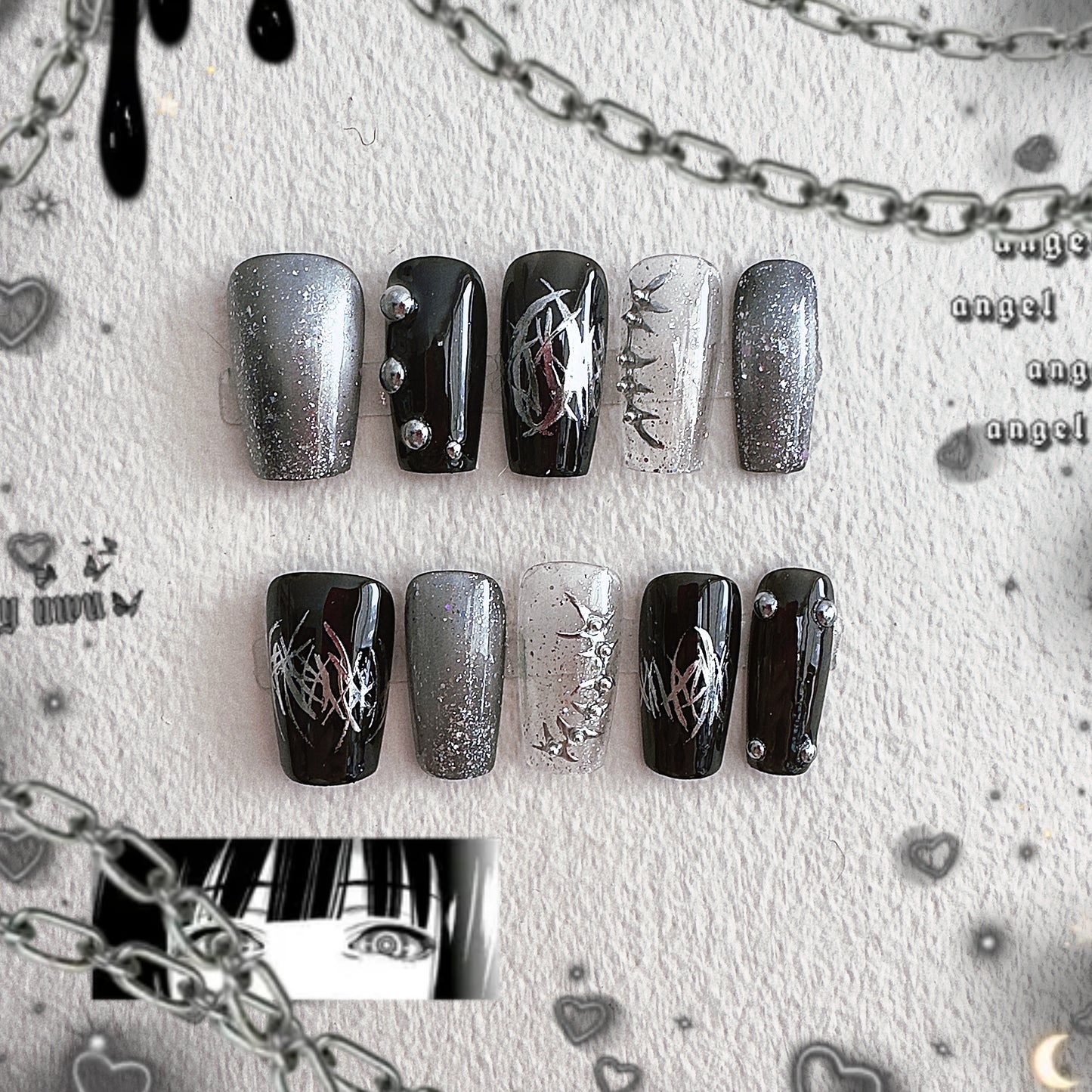 Front view of MYOB Nails Thornspine collection featuring 3D silver thorns, chrome liquid metal lines, and dark glitter accents.