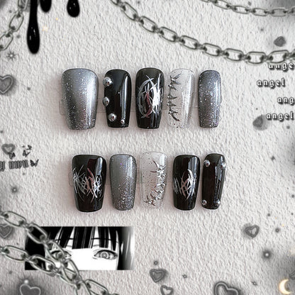 Front view of MYOB Nails Thornspine collection featuring 3D silver thorns, chrome liquid metal lines, and dark glitter accents.