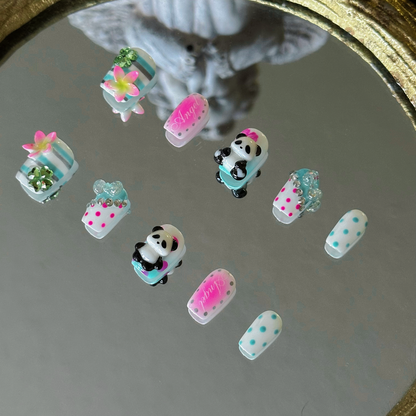 MYOB Nails Y2K panda and hibiscus square press-on nails, right side view, highlighting 3D charms and polka dot prints, neon pink and mint green design, retro custom manicure