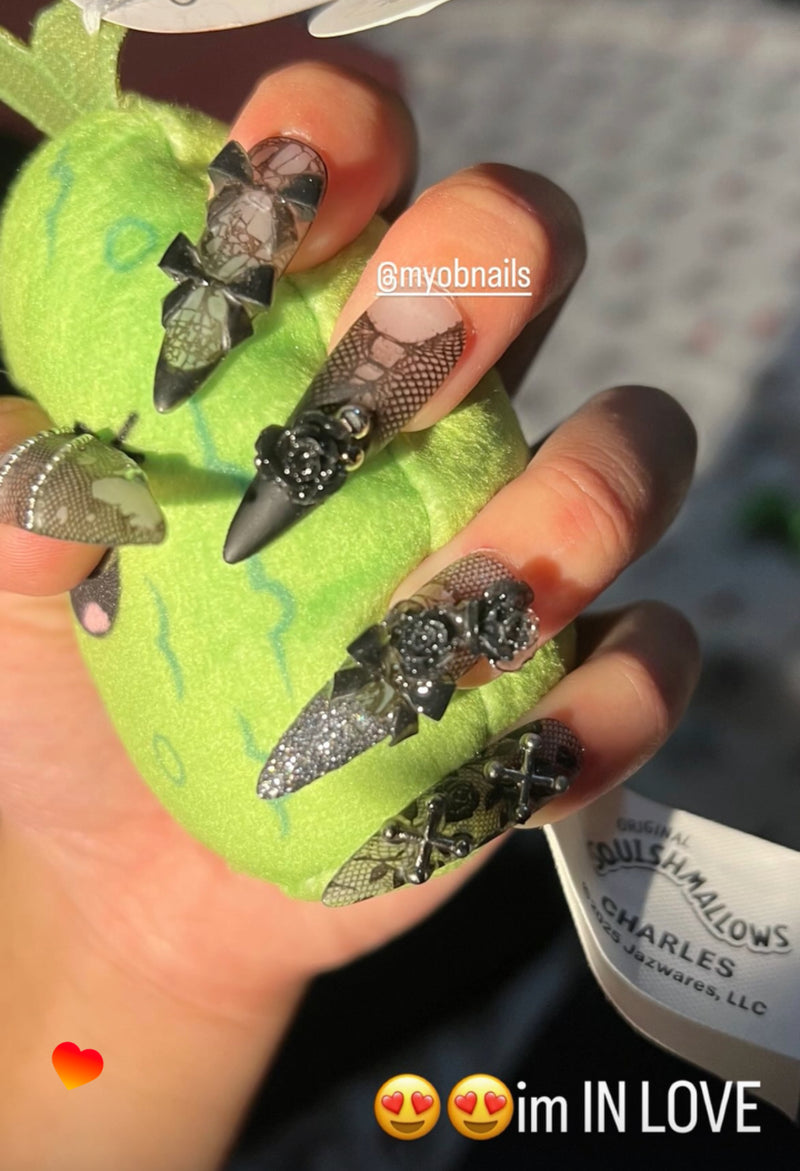 a photo from clients showing the custom gothic black lace set from myobnails