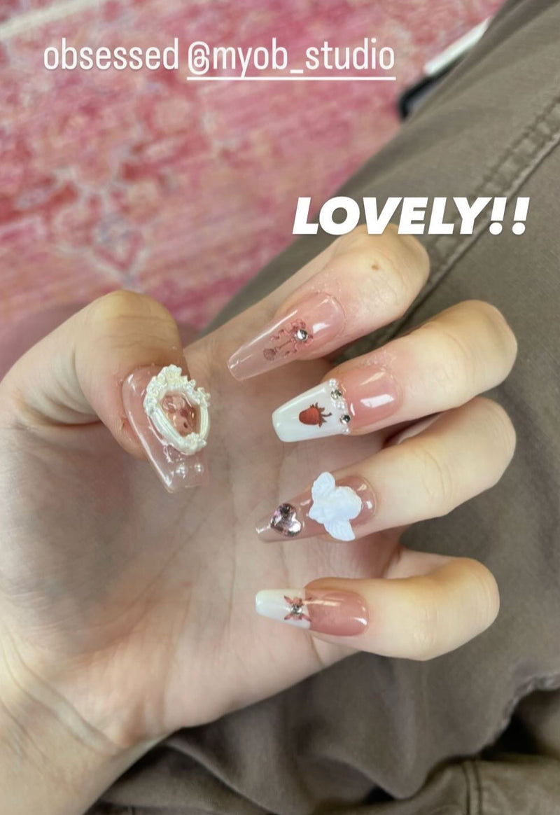 a photo from client show off the pressons from myobnails with angel