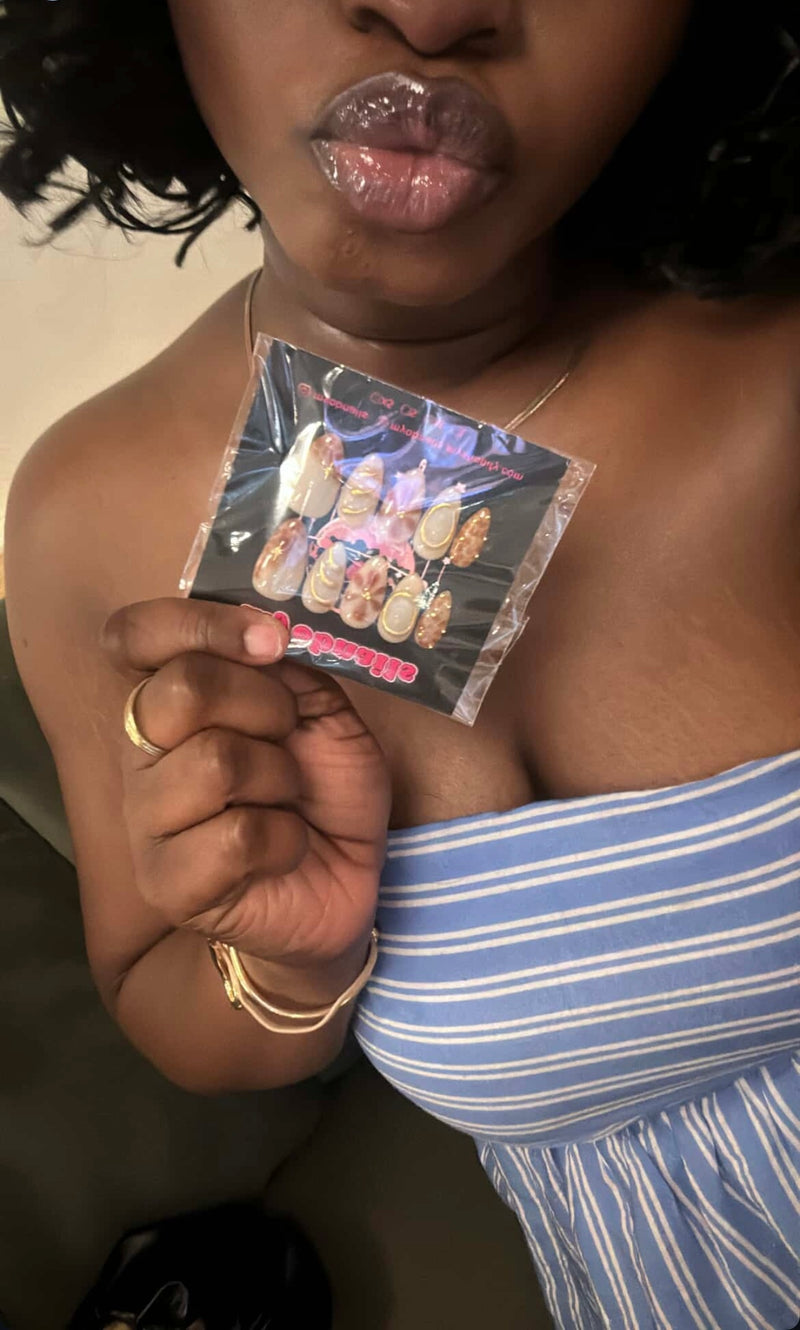 a photo from client while holding myobnails 