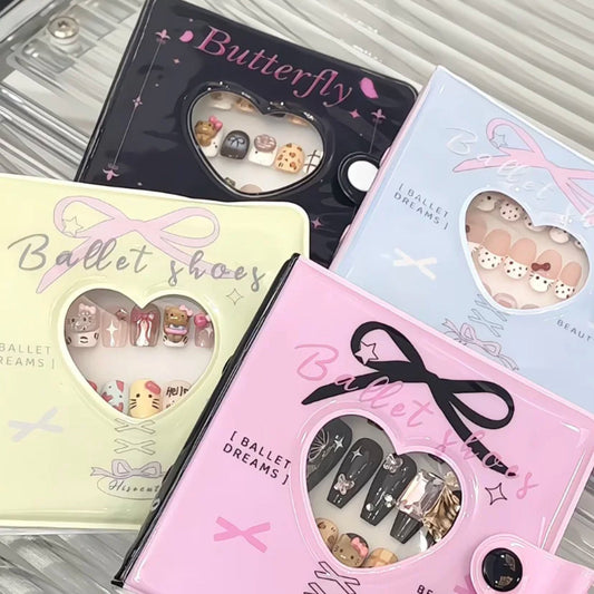 Four nail storage books labeled 'Butterfly', 'Ballet shoes', and 'Ballet dreams', with different colors like pink, black and yellow