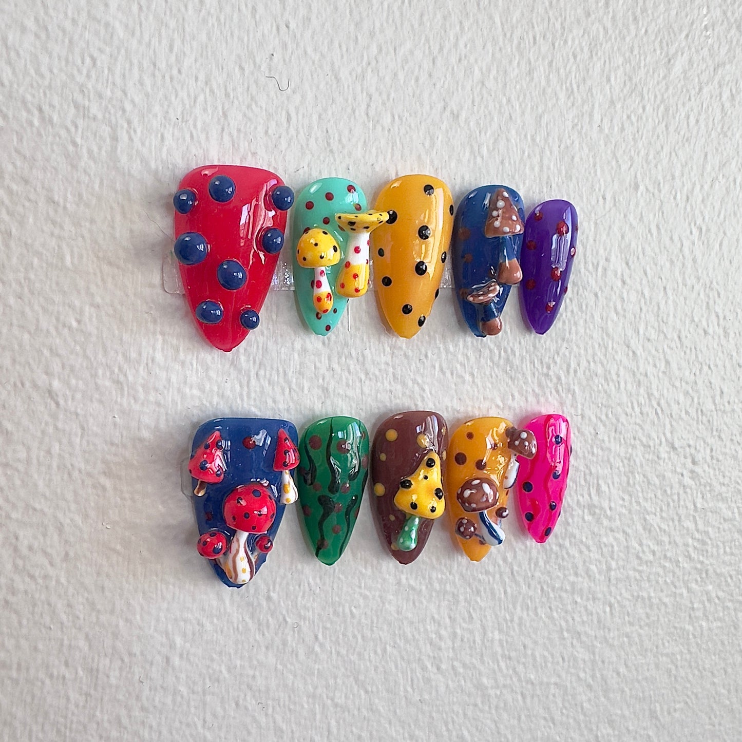 Close-up of the textured 3D mushrooms and precise hand-painted polka dots on the Mystic Shroom set.