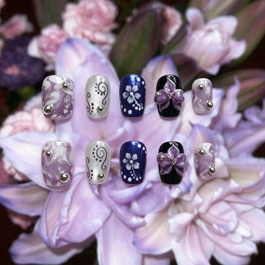 Orchid Mirage press-on nails by MYOB Nails, featuring handcrafted 3D purple orchids, intricate hibiscus sketches, and shifting aurora powder finishes.