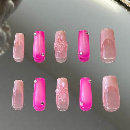 Back view highlighting the elegant long almond shape and the smooth glossy finish of the Pink World set.