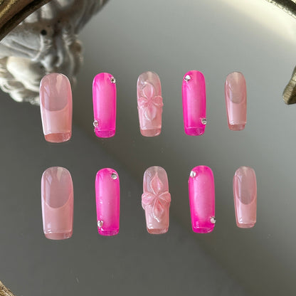 Front view of Pink World handmade nails showing the blend of white blush gradients and delicate pink French tips.