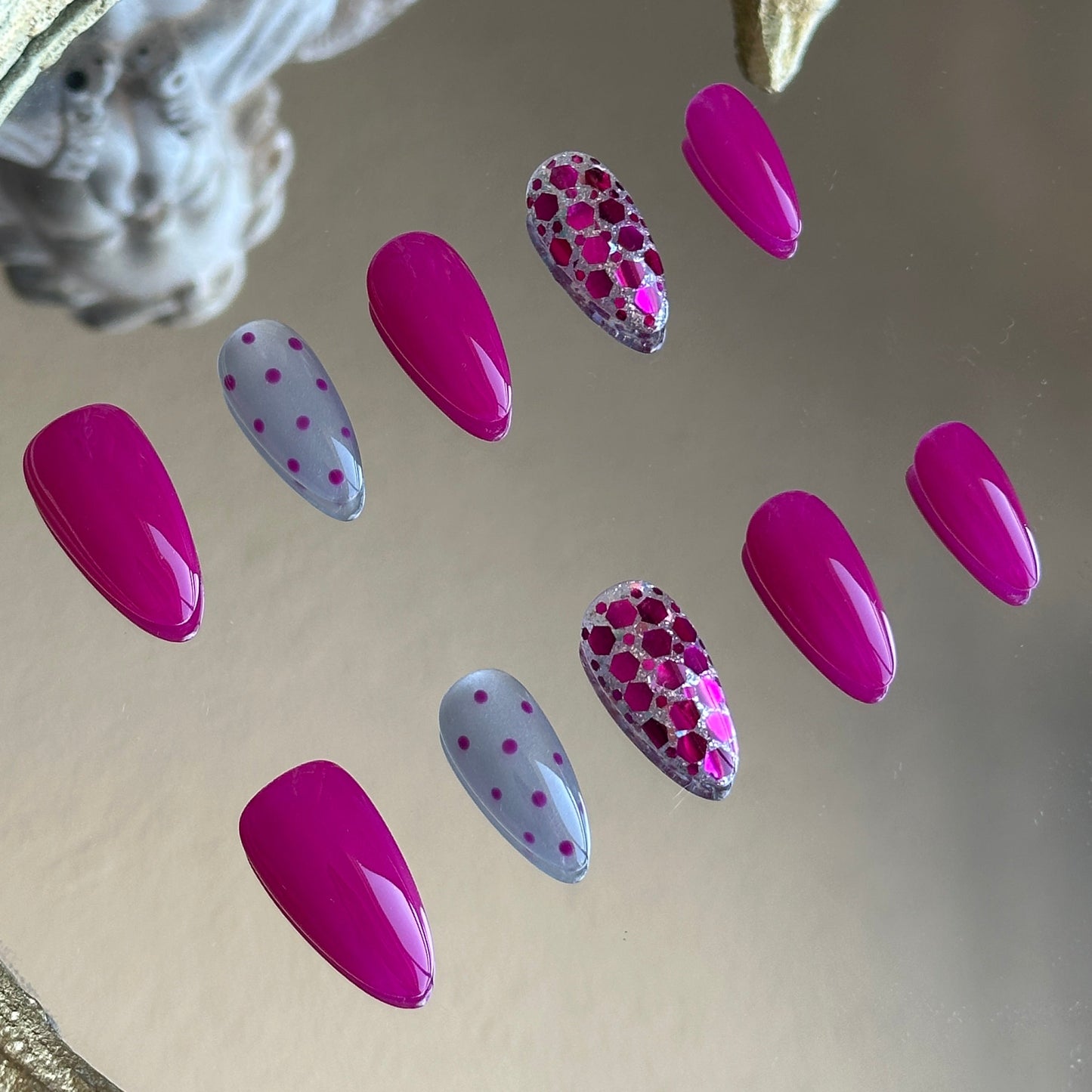 Left side detail of MYOB Nails highlighting the silver fine shimmer base layered with rich plum glitters.