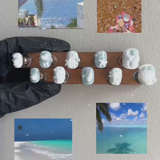 A behind-the-scenes look at the handcrafted process of Siren's Treasure press-on nails by MYOB Nails, transitioning from detailed artistry to the final shimmering 3D seashell result.