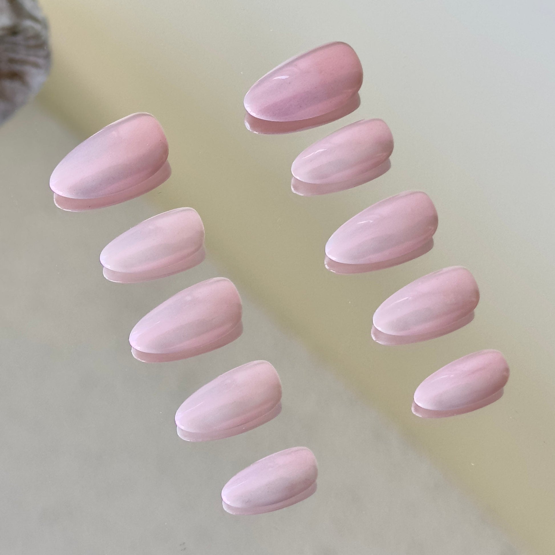 Side view highlighting the flawless glazed finish and clean pink tones of the Princess Nails set.