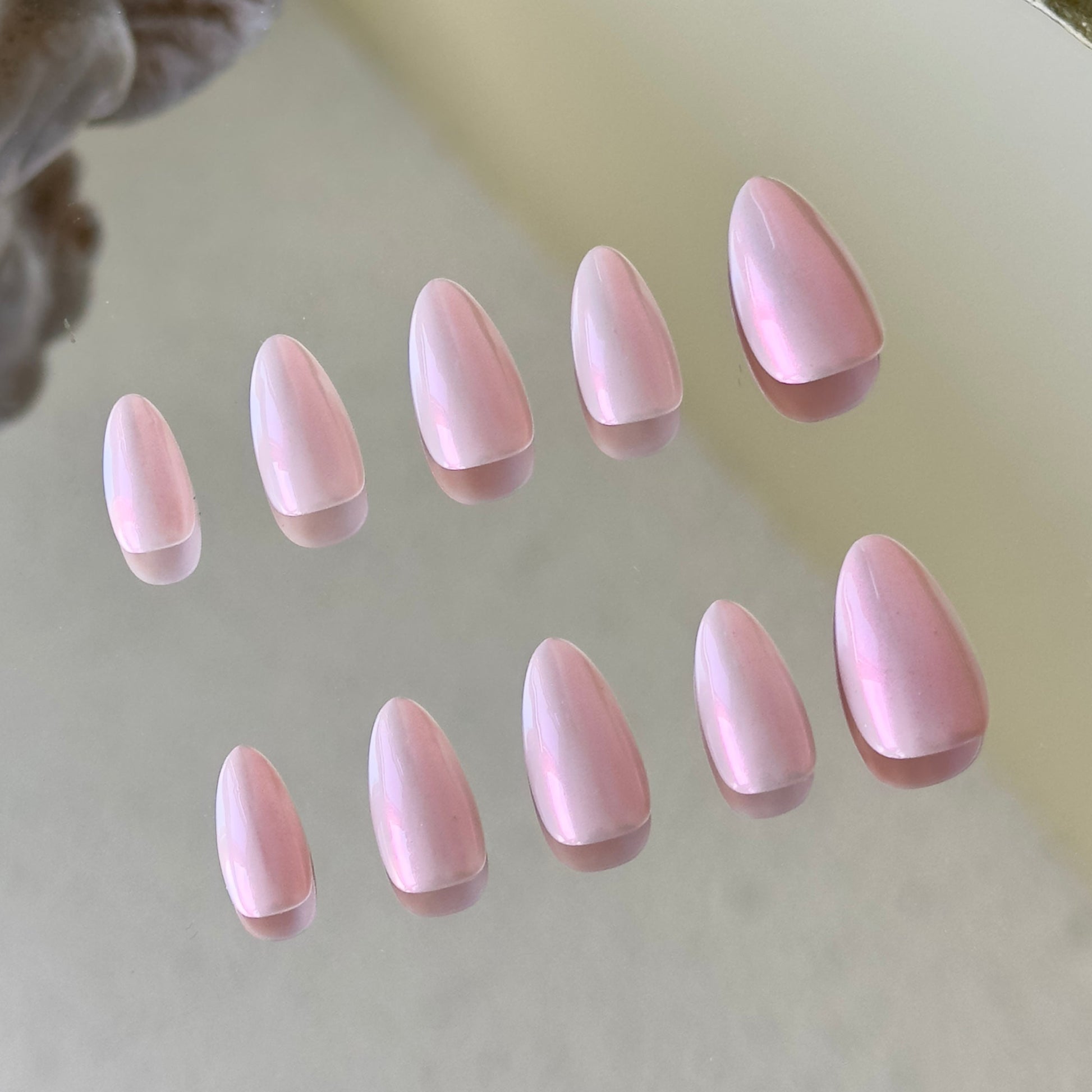 Back view showcasing the refined nail shape and the high-end pearly luster of Princess Nails.