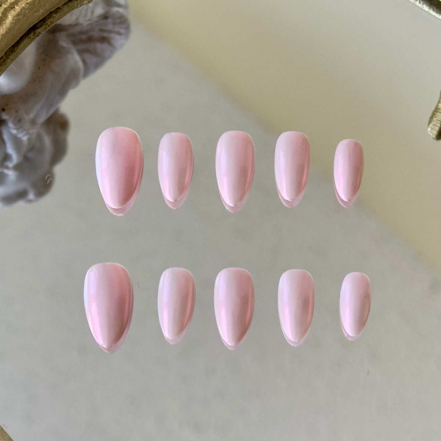 Front view of Princess Nails showing the elegant minimalist pink glow and pearlescent texture.