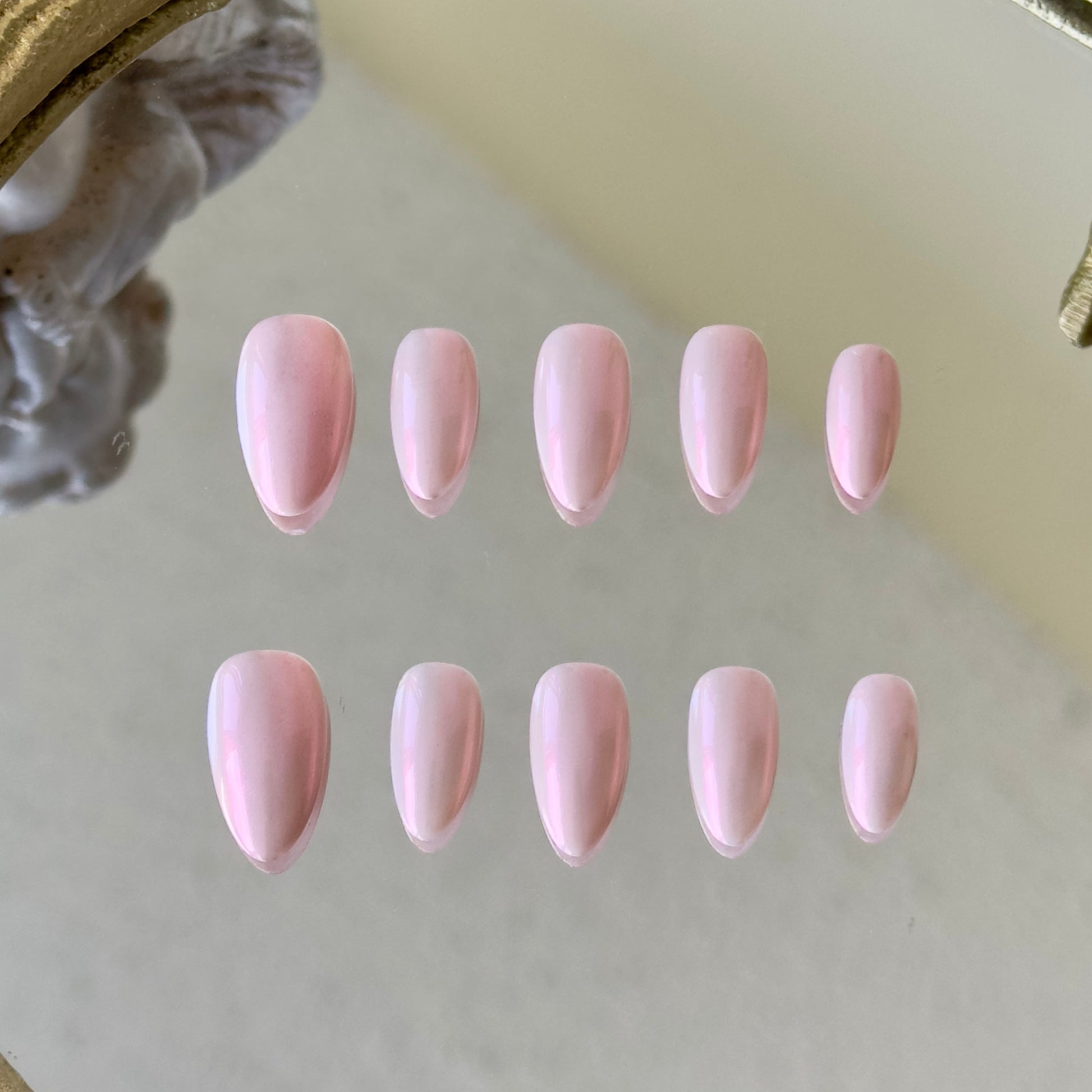 Front view of Princess Nails showing the elegant minimalist pink glow and pearlescent texture.