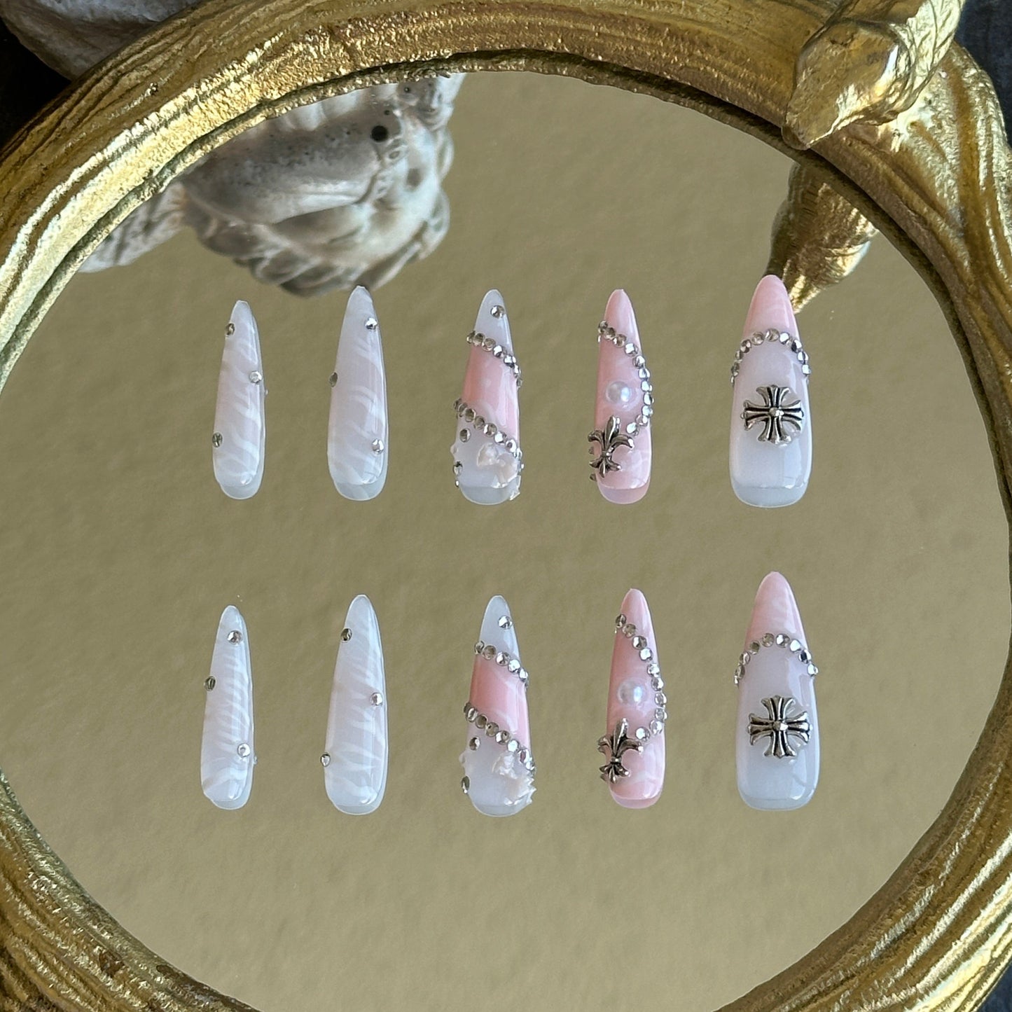 Back view of the Princess Rebel handcrafted nail set by MYOB Nails, displaying the consistent artistic finish on all nails.