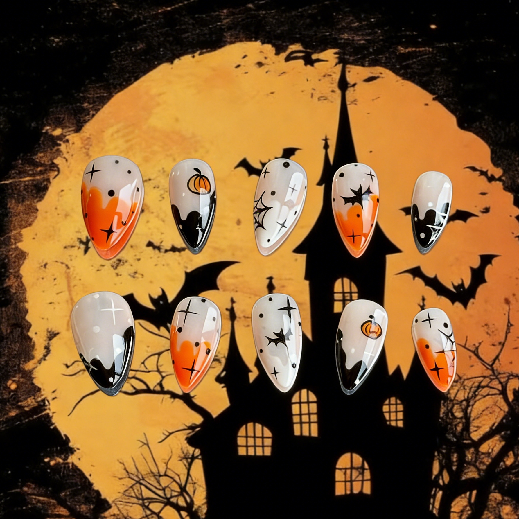 Pumpkin Spell press-on nails by MYOB Nails featuring pumpkin, bats  and Halloween-themed art.