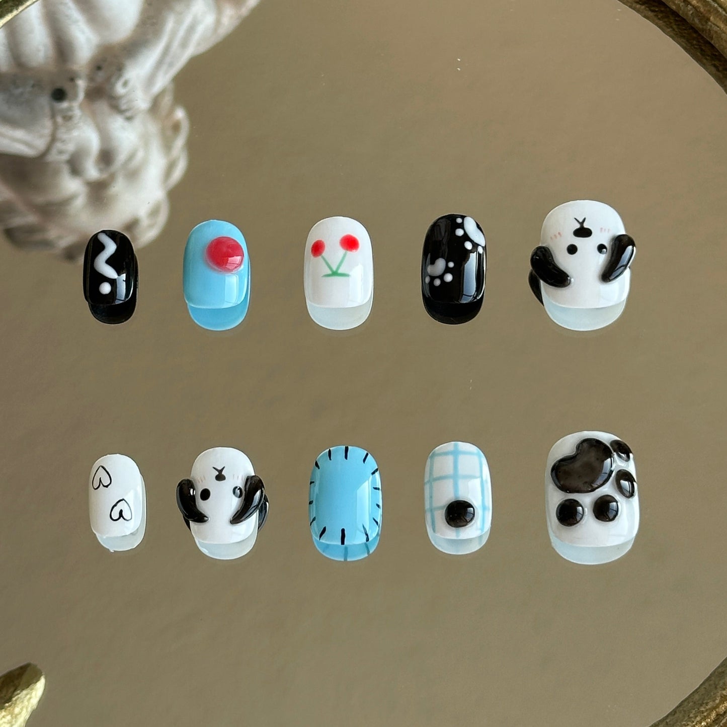 Back view of the Puppy Love handcrafted nail set by MYOB Nails, showcasing a playful and vibrant dopamine aesthetic.