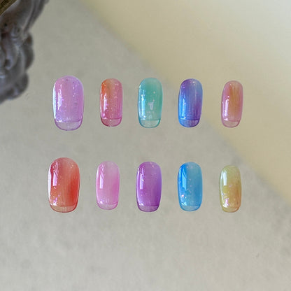 Front view of Rainbow handmade nails with vibrant multi-tonal pure color gradients.