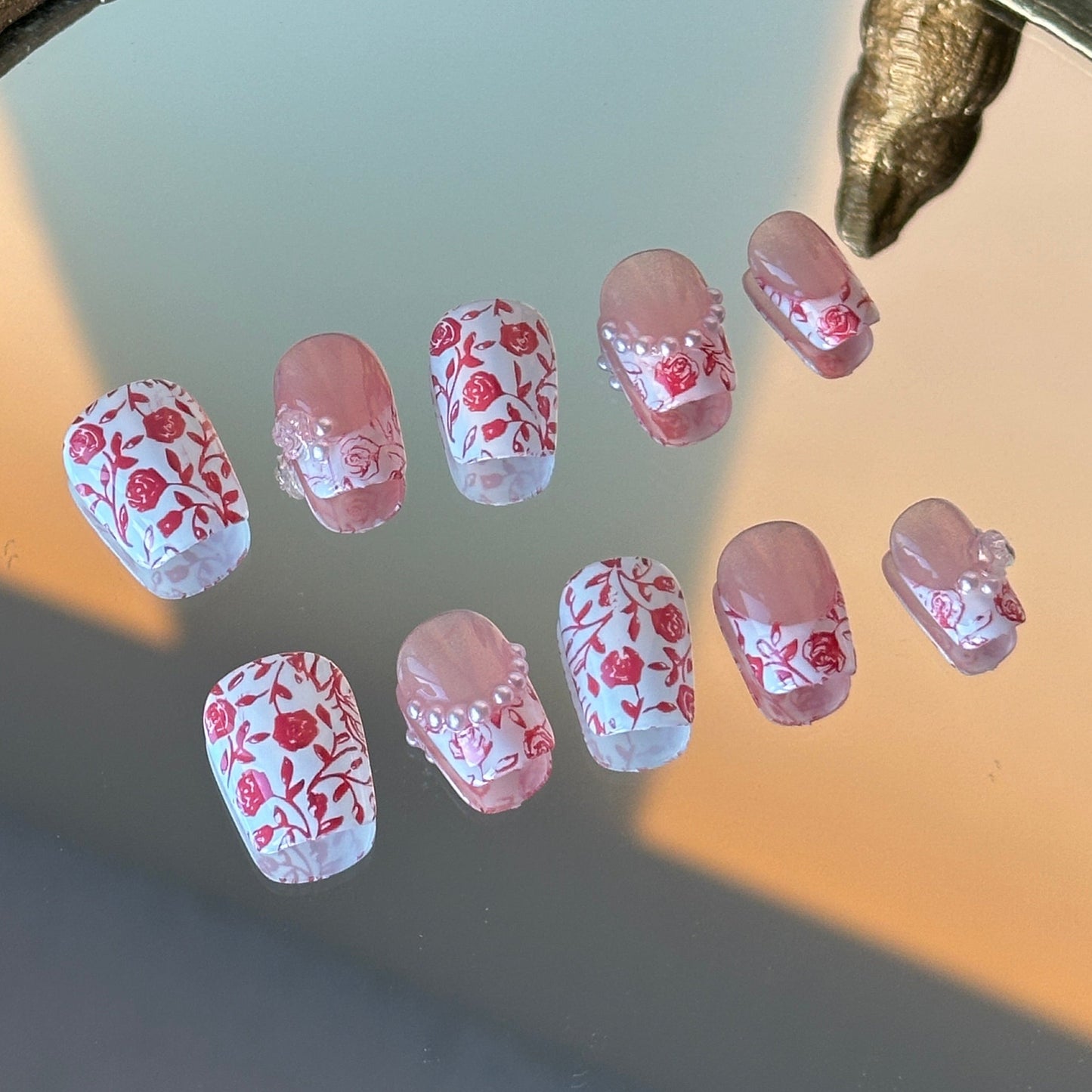 Close-up detail of the delicate pearl border along the French tip resembling a necklace by MYOB Nails.