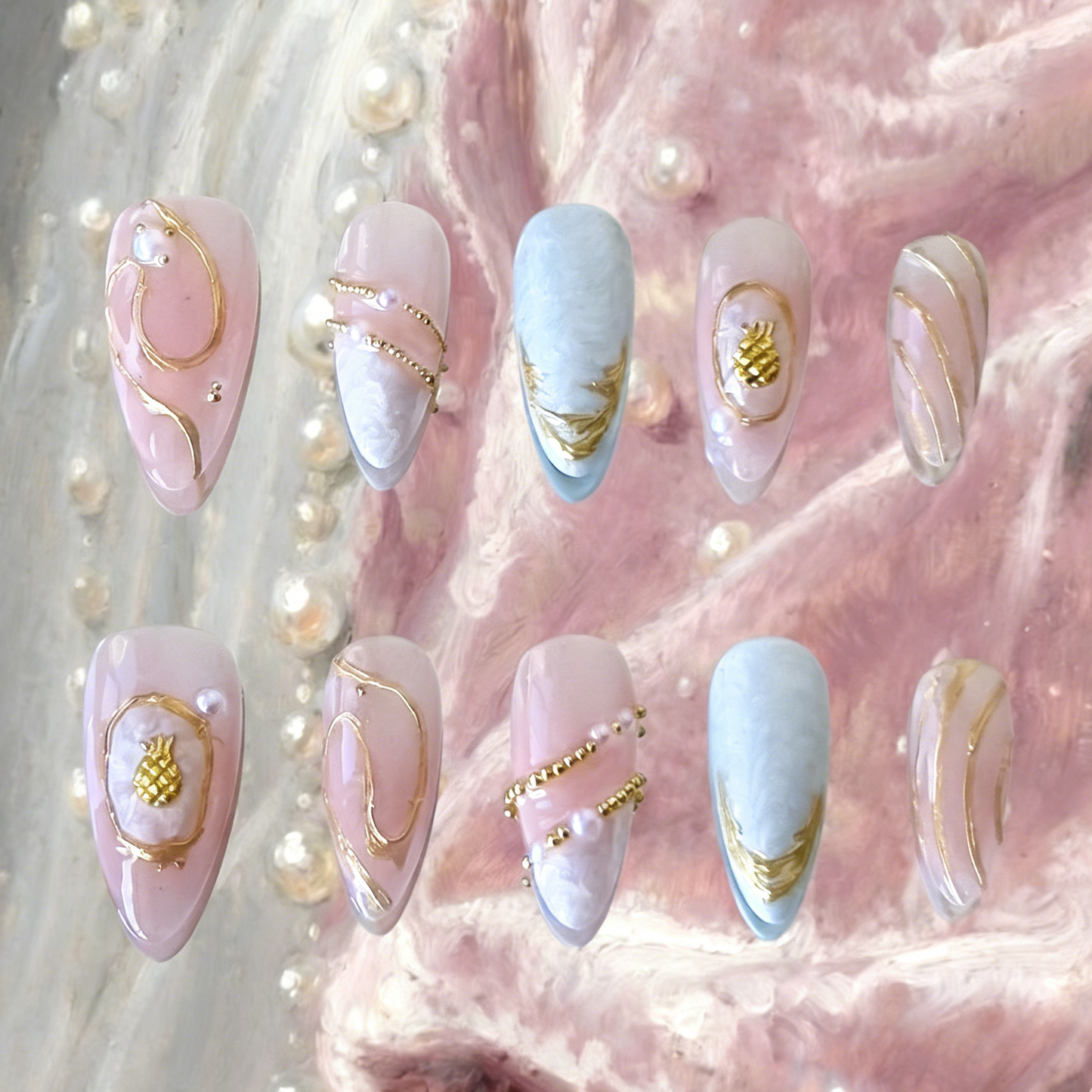 Seraphine by MYOB Nails featuring pink blush gradients, 3D white thread gel textures, and irregular gold chrome French tips.
